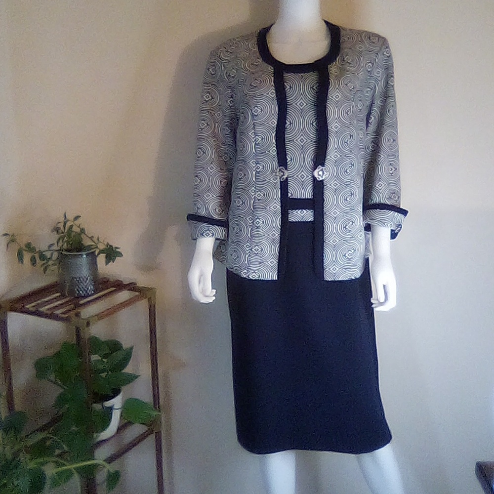 Masseys dress suit size 16.  Navy blue in color, made of 95% poly. & 5% spandex.
